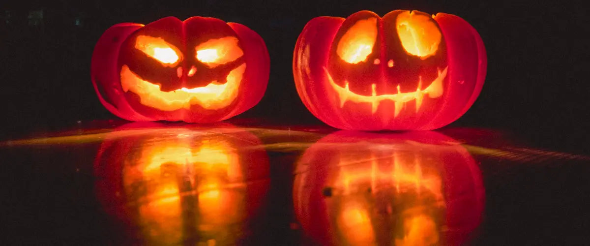 Two glowing jack o' lanterns