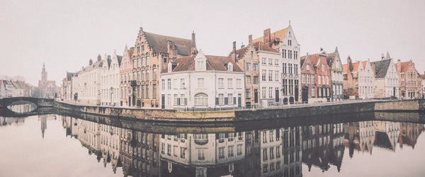 Buildings along a canal in Bruges, Belgium