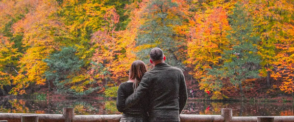 A couple standing together looking at a forest in Yedigöller National Park, Turkey