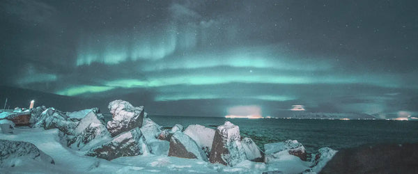 The Aurora Borealis (Northern Lights) as seen over a glacier lagoon in Iceland