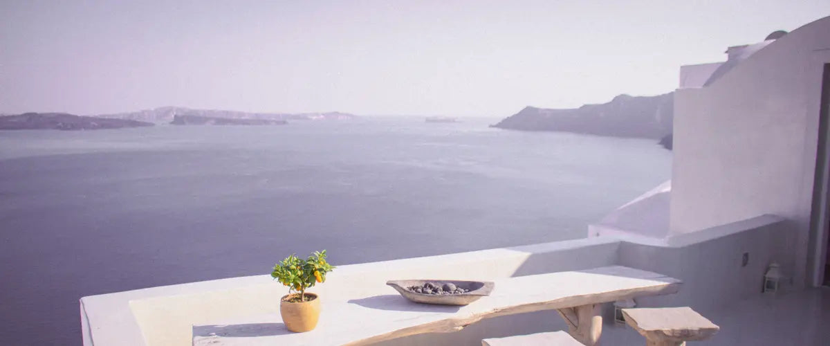 A table overlooking the sea in Oia, Greece