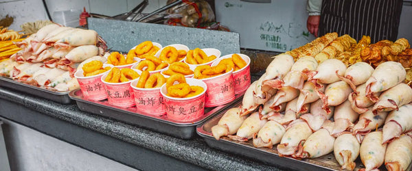 Iconic Beijing dishes being served at a street food stall