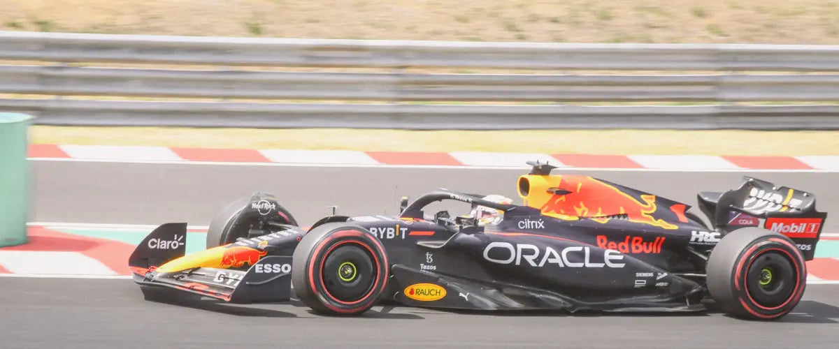 A Red Bull F1 car, mid-race
