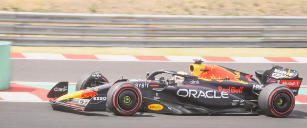 A Red Bull F1 car, mid-race