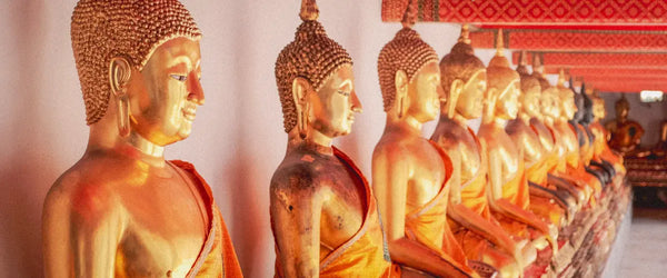 Golden Buddha statues in Wat Pho, Bangkok, Thailand