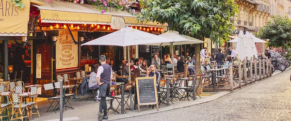 Outdoor seating at a cafe in Paris, France
