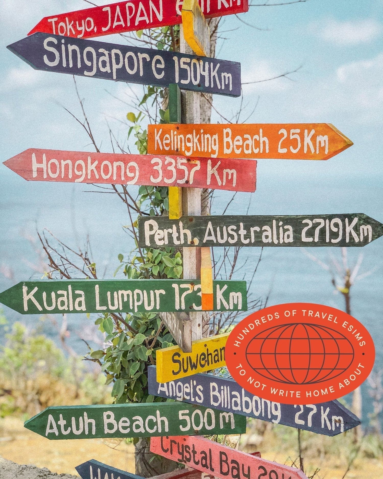 Rustic beach sign with distances between world cities