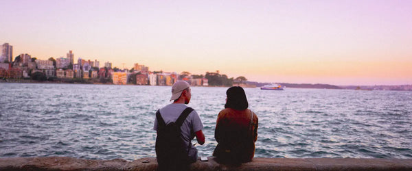 A couple looking across the water in Sydney, Australia