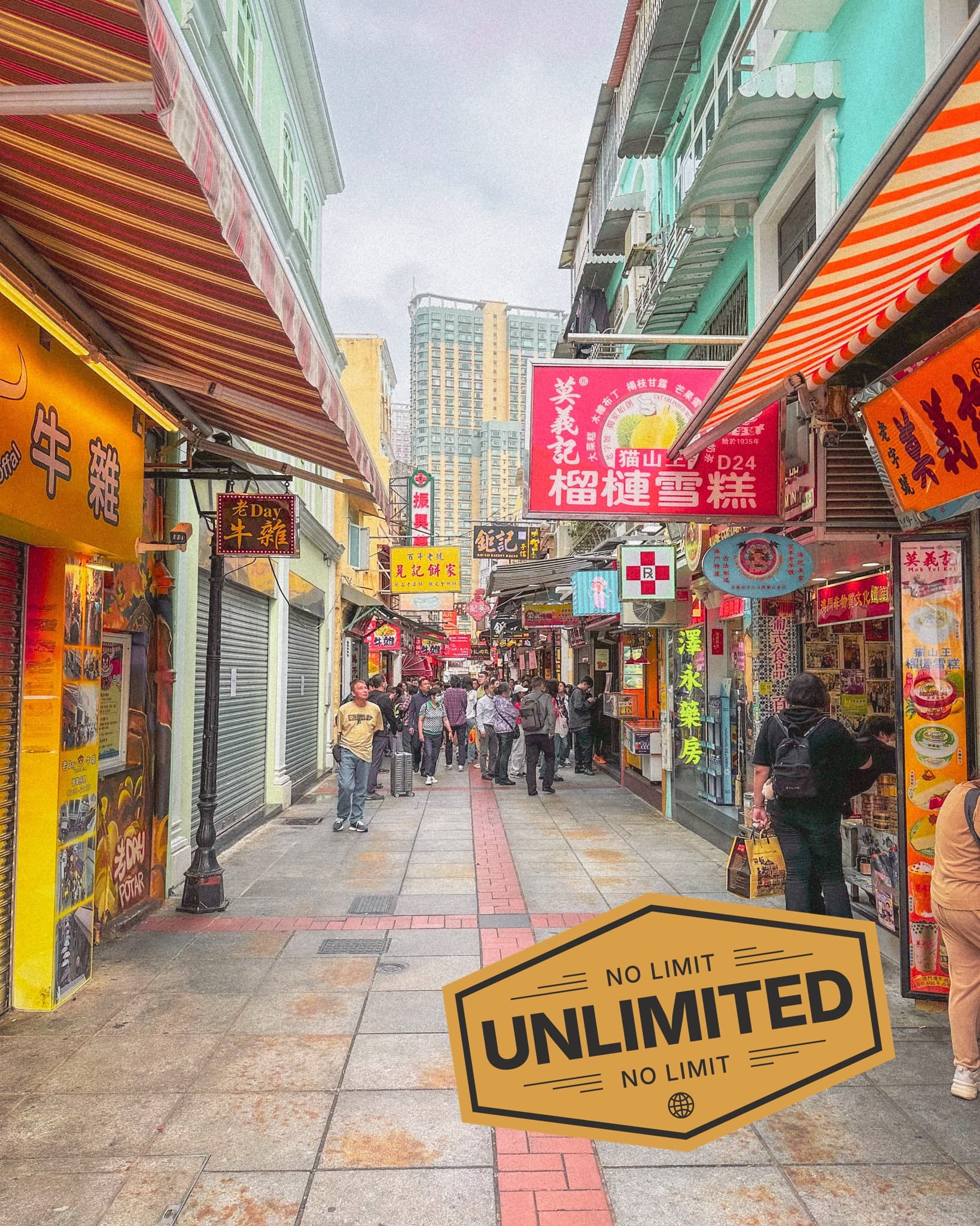 Macao street-scene showing pedestrianised shopping area, promoting eSIM unlimited data for travellers